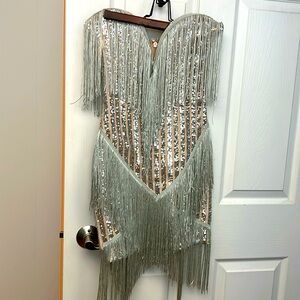 Sparkling tube dress with sequin embellishments and tassles